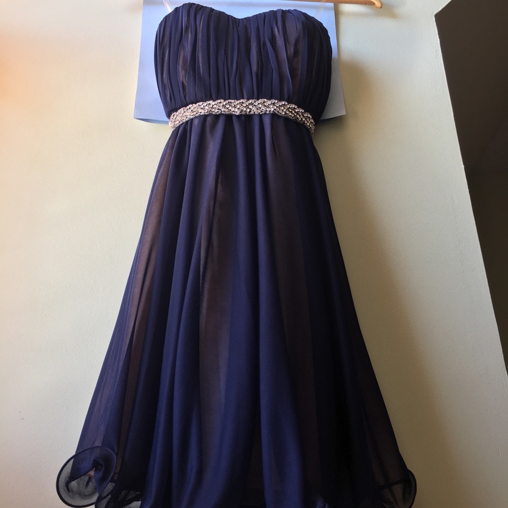 Formal strapless dress with sequined belt